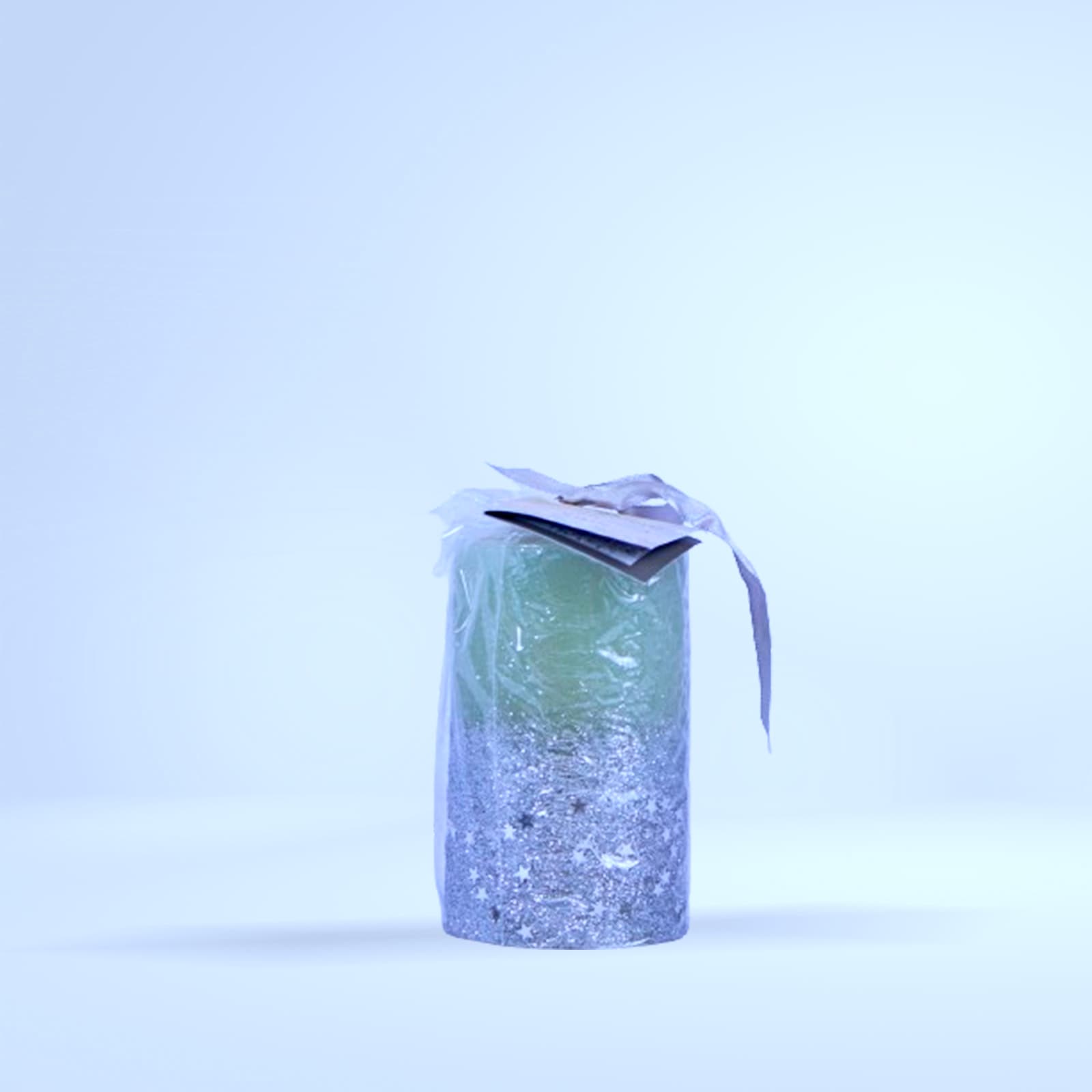 Bougie dégradée vert/argent pailletée (étoiles)