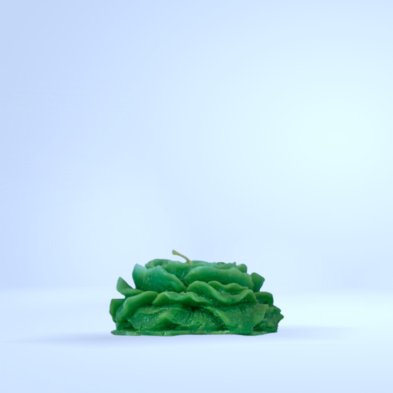 Bougie sculptée rose verte fluo
