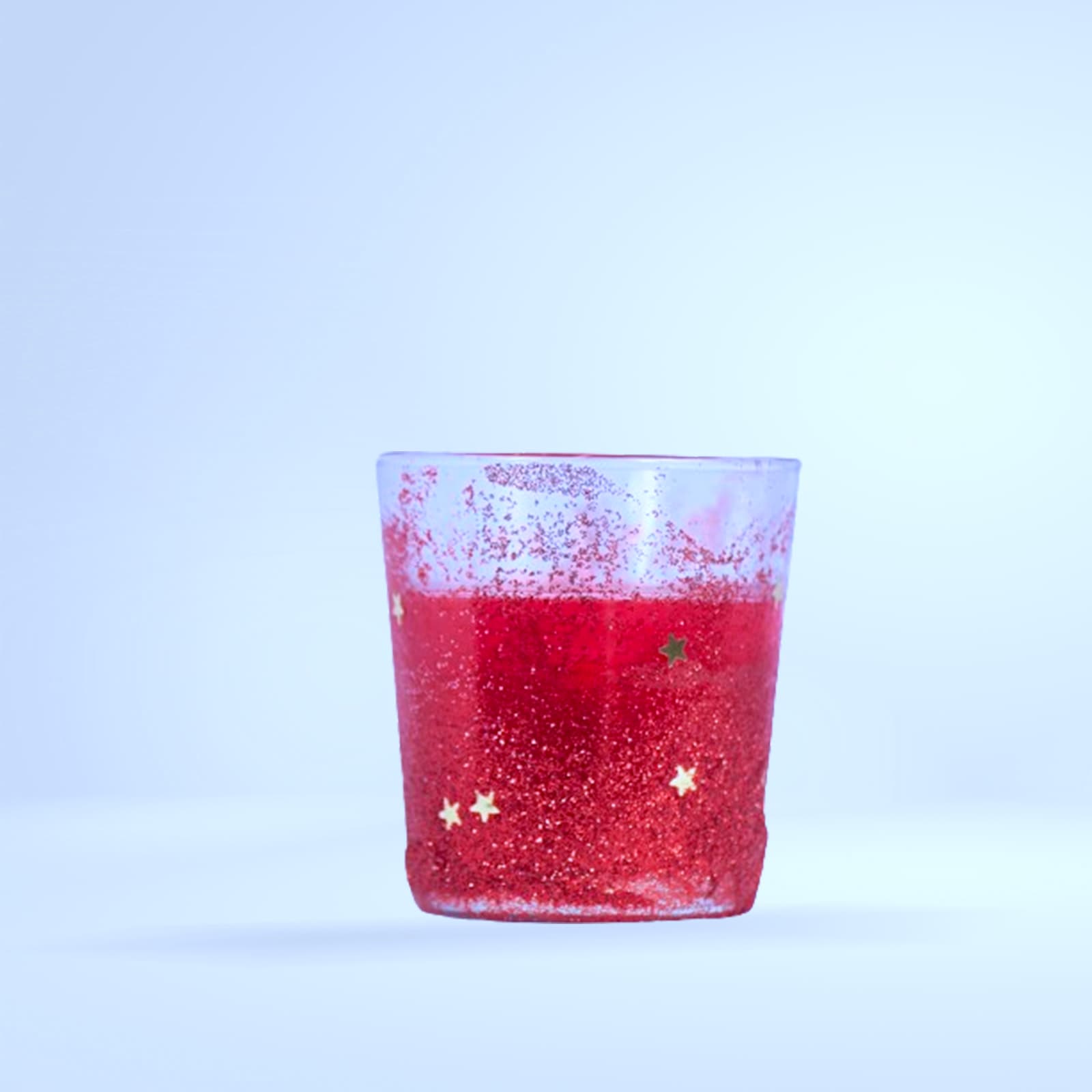 Bougie chauffe-plat rouge pailletée (étoiles)